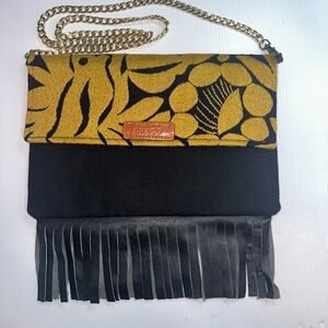 Womens Draco Mexico
Embroidered Gold/Black
Fabric/leather Fringe
Crossbody Purse